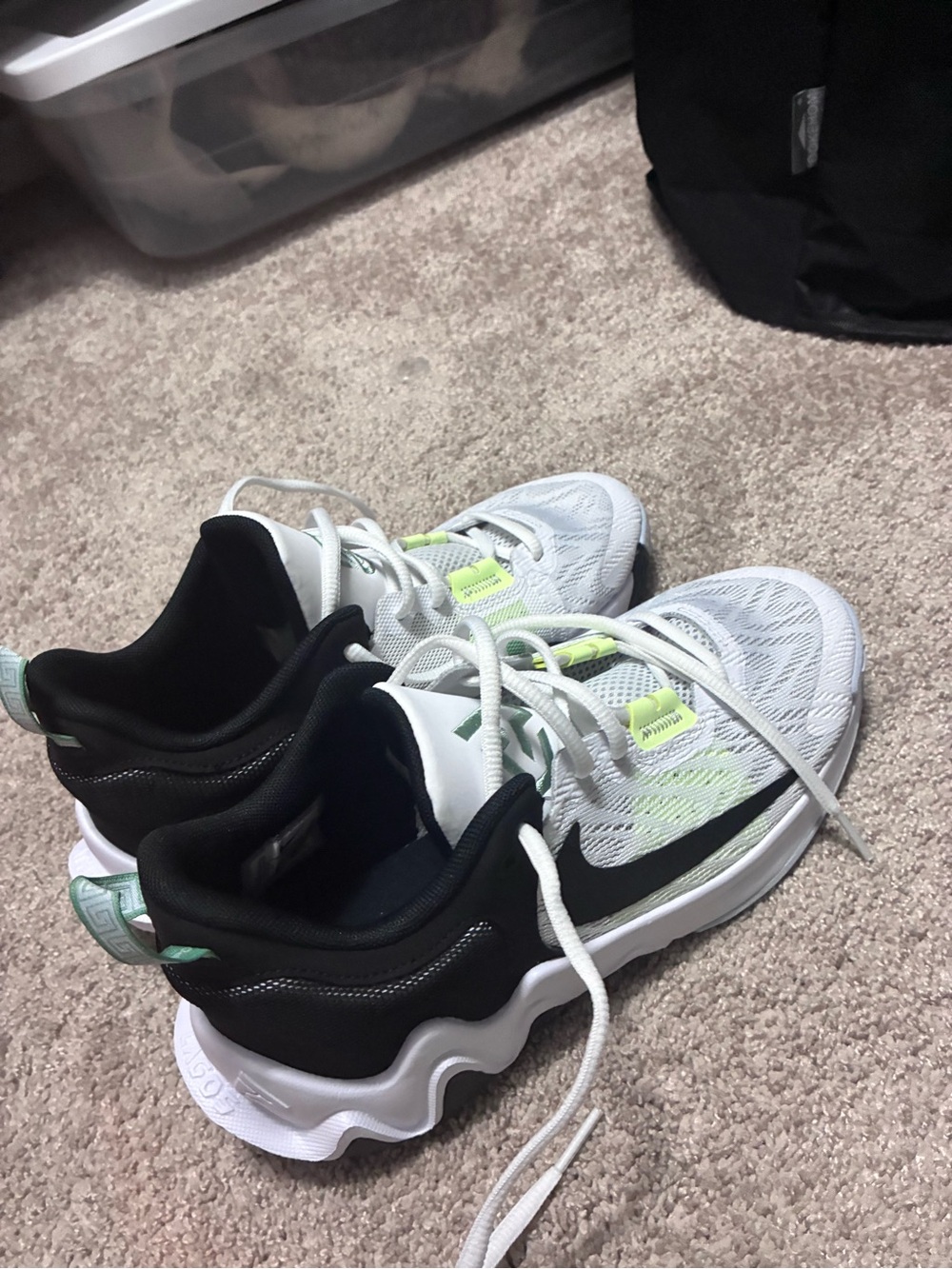 Nike Kids White and Black Sneakers with Neon Green Accents. Giannis